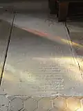 Dalle funéraire d'un laboureur et de sa femme.