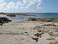 L'horizon à droite est formé par Inis Airc avec la falaise proéminente de Shark Head (2009)