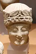 Tête d'éphèbe. Terre cuite, époque chypro-classique I - II : I, 475-400 AEC et II, 400-325 AEC