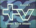 Logo trilingue avec l'indicatif Chaîne 1 pour la Suisse romande diffusé à l'antenne de 1969 au 6 janvier 1985.