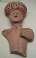 Fragment de statuette d'argile provenant d'Ibiza des IVe&nbsp;– IIIe&nbsp;siècles&nbsp;av. J.-C.