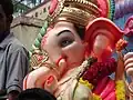 Tête d'une statue de 2&nbsp;m de haut, défilant dans Bangalore
