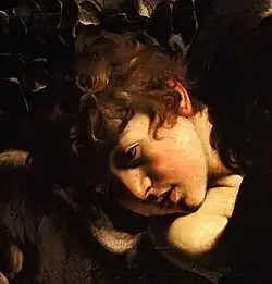 Peinture d'un visage de jeune garçon brun, frisé