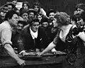 The Spoilers (1914) : William Farnum, Wheeler Oakman et Kathlyn Williams (au premier plan, de g. à d.)