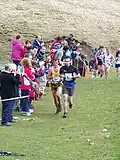Spectateurs encourageant les coureurs