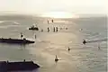 Divers bateaux à l’entrée du port de plaisance