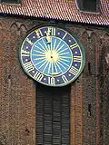 Horloge « du doigt de Dieu » à Toruń en Pologne.