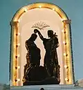 Baptême de Jésus par Saint Jean-Baptiste, sculpture sur bois.