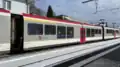 Voiture intermédiaire AB n°3032 en gare de Sainte-Croix