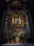 Vierge à l'Enfant (XVe&nbsp;siècle) au-dessus de l'autel