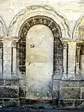 Porte bouchée au nord du narthex.