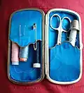 Trousse à couture de voyage.