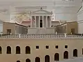Maquette du forum à la fin du IIe&nbsp;siècle : portiques et Capitole avec vue sur le dispositif de retenue de la colline.