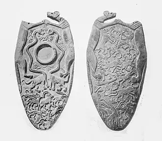 "Tablette aux deux chiens" Hiérakonpolis, époque prédynastique.