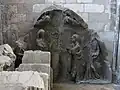 Photo du tympan du portail Saint-Siméon, déposé dans la chapelle nord Saint-Julien
