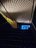 Escalier d'accès à la salle.