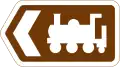 Direction de l'attraction touristique indiquée par un symbole