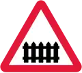 Passage à niveau équipé de barrières