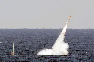 Tir d'un Tomahawk depuis le SSGN USS Florida, lors de l'exercice naval « Giant Shadow », au large des côtes des Bahamas.