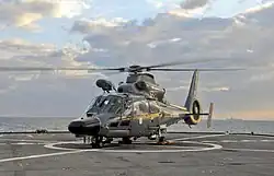 Le Dauphin SA 365F no&nbsp;322 utilisé pour les missions Pedro à bord du USS&nbsp;Mount Whitney, le navire-amiral de la Sixième flotte des États-Unis, durant l'opération Harmattan en 2011.