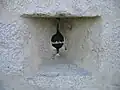 Archère-canonnière à ébrasement triangulaire philippienne, remparts de Provins.