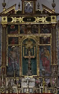 Polyptyque de la Santa Crous du maître autel dans le chœur réalisé par Guillaume Planeta, daté de 1584, représentant saint Dalmas, saint Roch et les évangélistes