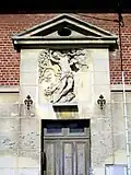 Statue de saint Sébastien sur la maison de l'Archer.