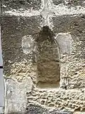 No&nbsp;14, vestige d'un système d'éclairage public à l'huile.