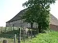Chivres - vieille ferme et bœuf charolais.