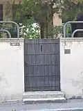 Maison de madame Garnier : le portillon au 5 rue de la Mignonne.