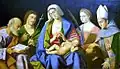 With St Joseph, John the Baptist, Catherine of Alexandria, Louis of Toulose and writer Lodovico Ariosto.
