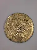 Plaquette en argent doré ; Vierge à l'enfant.