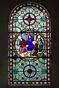 Vitrail représentant l’enfance de Jésus, la sainte famille, dans l’église Saint-Sulpice à Breteuil-sur-Iton.