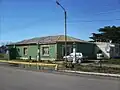 Un vieux bâtiment qui était autrefois un hôtel et une station-service à Fitz Roy.