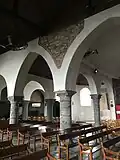 Vue sur l'unique niveau d'élévation de la nef (grandes arcades).