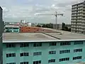 Vue vers le centre ville avec la résidence Flora-Tristan au premier plan, et la grue, élément fréquent du paysage depuis la mise en place du GPV.