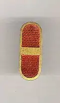 Insigne de warrant officer junior pendant la 2e&nbsp;Guerre mondiale. Ce grade et son insigne ont été créés en même temps que le grade immédiatement supérieur de chief warrant officer