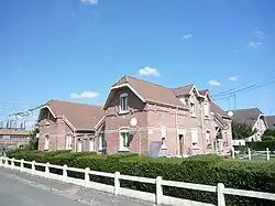 Habitations groupées par deux.