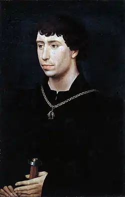 Peinture en buste, de trois quarts, avec collier de l'ordre de la Toison d'or. Vêtu de noir, sur fond d'un vert très sombre. Ses mains tiennent une épée dont on voit le pommeau.