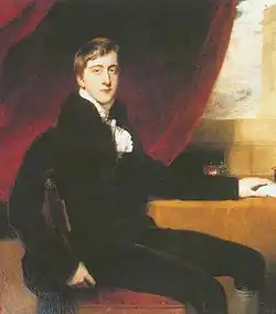 Portrait à l'huile. Jeune homme vêtu de noir, assis.