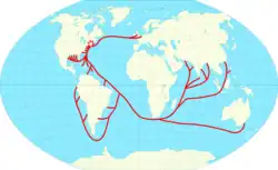 Carte du monde avec des lignes rouges dans les océans reliant la Nouvelle-Angleterre à diverses régions du monde.