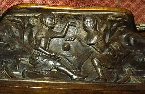 Jeu de balle : sculpture sur une miséricorde.