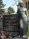 Allégorie veillant sur une tombe fleurie