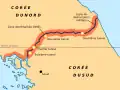 Carte de la région de la frontière entre la Corée du Nord et la Corée du Sud. La frontière est tracée en violet, la zone démilitarisée est indiquée en orange et le 38e&nbsp;parallèle est affiché par une fine ligne noir.