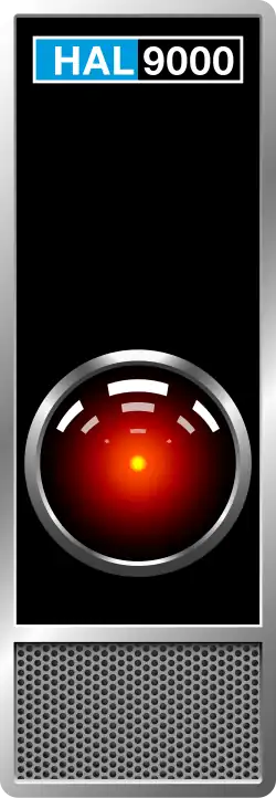 Réplique du panneau de communication de HAL, avec son capteur optique rouge au milieu, et une enceinte/microphone grise en basDans les films, HAL est vu observer l'activité du vaisseau grâce à des panneaux comme celui-ci, avec son capteur animé en son centre d'un point de lumière rouge, donnant l'impression d'un œil..
