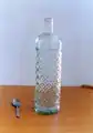 Bouteille et petite cuillère